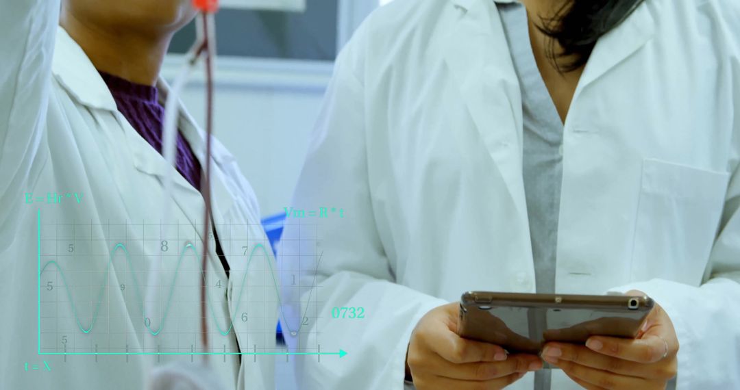 Scientists Analyzing Data with Digital Tablet in Modern Laboratory