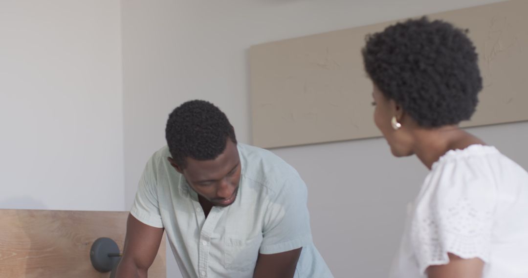 Friends Laughing and Sharing Stories While Reading at Home