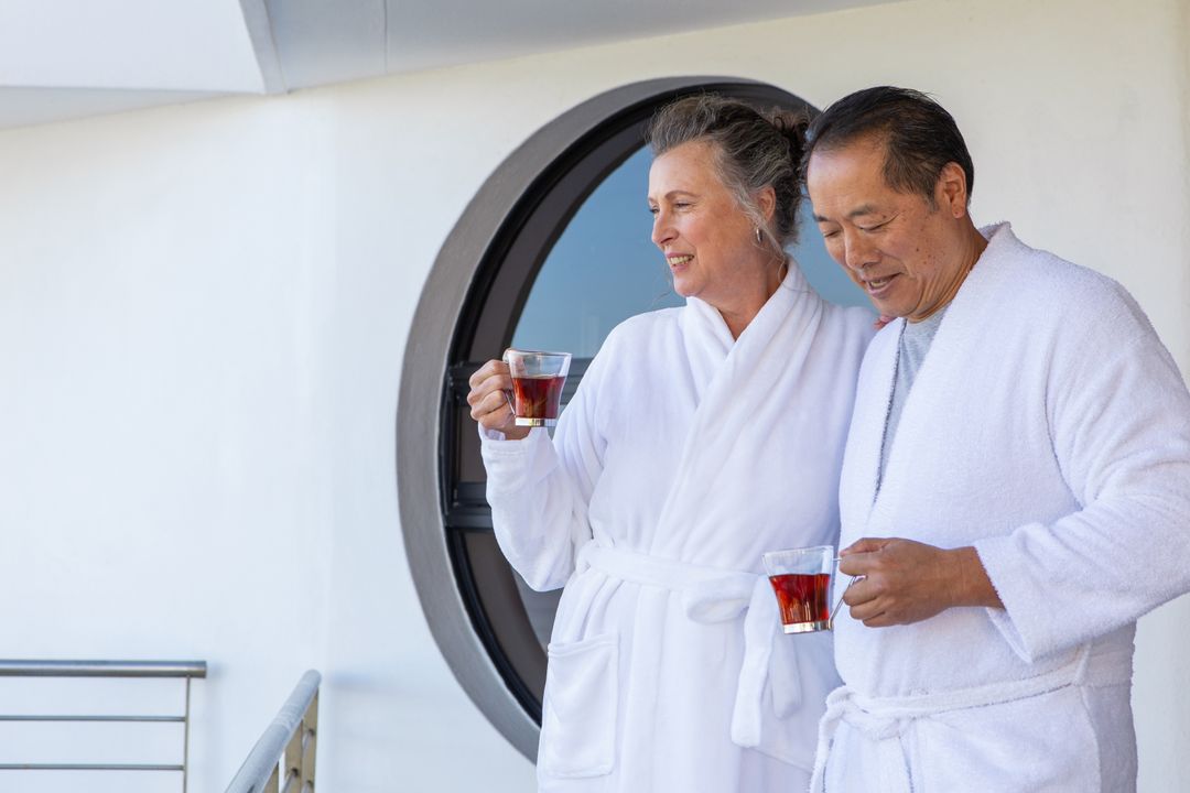 Senior Couple Enjoying Leisurely Tea Time on Cruise Ship Deck
