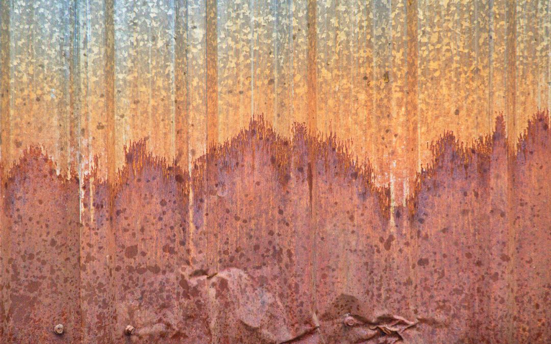 Textured Rustic Metal Corrosion Showing Diverse Colors
