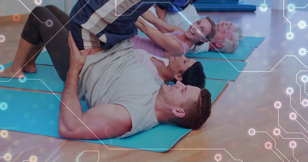 Group Fitness Training with Supportive Instructor and Enthusiastic Participants