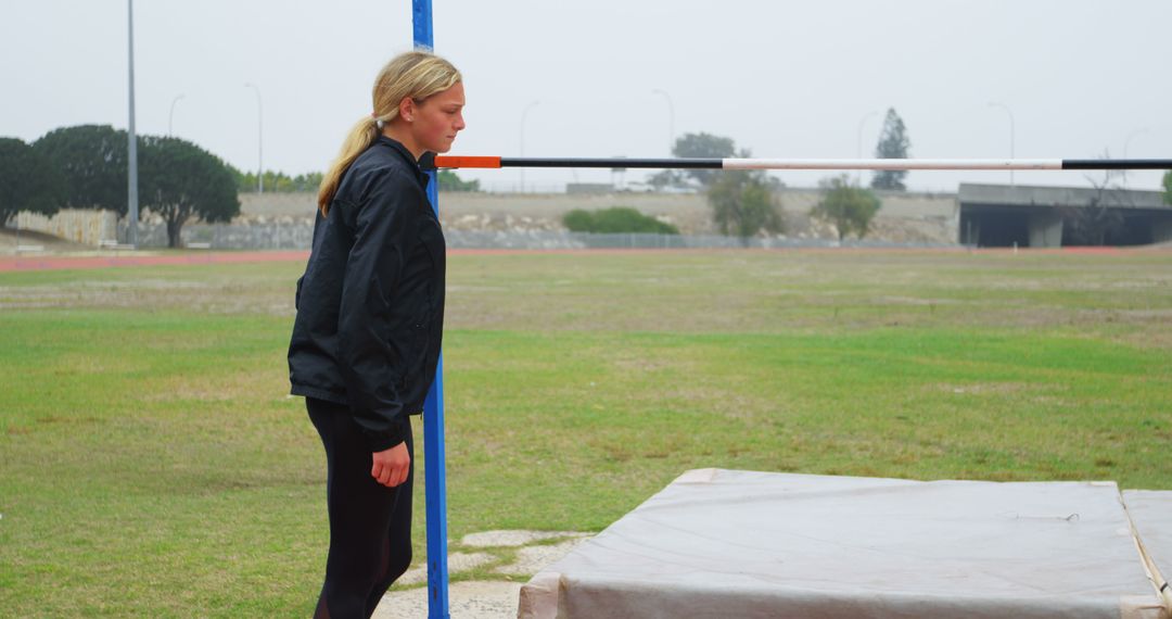 Female Athlete Preparing for High Jump Training Outdoors - Free Images, Stock Photos and Pictures on Pikwizard.com