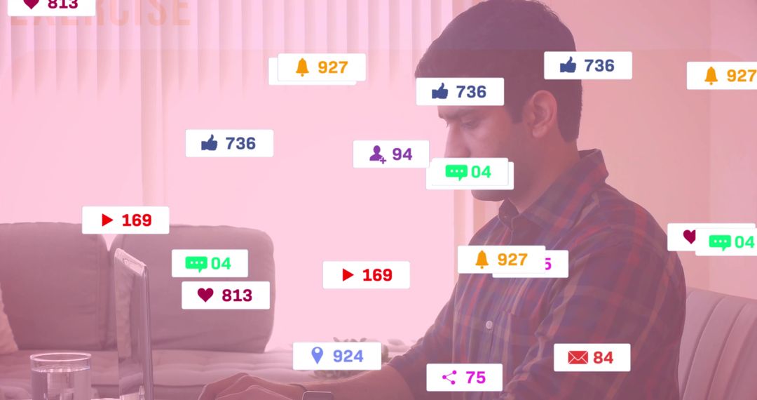 Focused Man Engaged in Social Media Notifications While Working