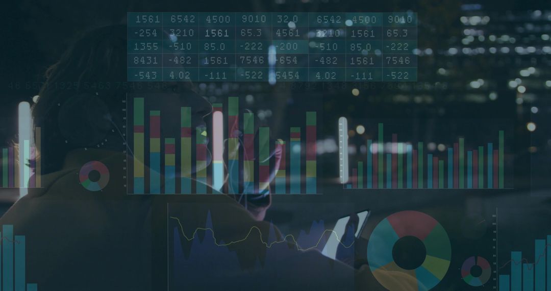 Data Analyst with Headphones Analyzing Charts Late at Night