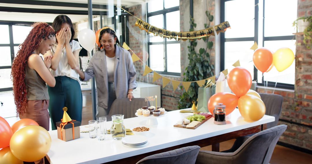 Surprised Colleagues Celebrate Birthday with Cake in Office Setting