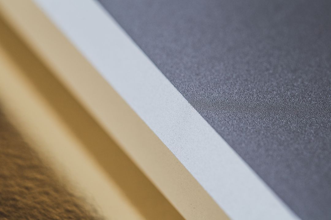 Abstract Texture of Stacked Paper Sheets in Close-Up View