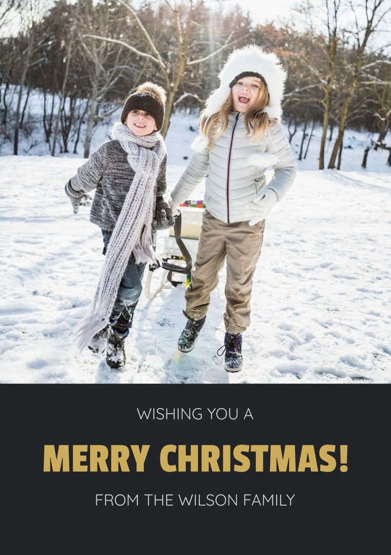 Joyful Children Playing in Snow for Merry Christmas Greetings