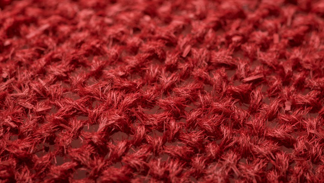 Macro burgundy knitted openwork with fuzzy yarn diamond texture for background use