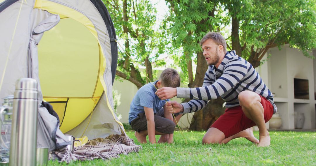 Father Helping Son Set Up Tent in Backyard - Free Images, Stock Photos and Pictures on Pikwizard.com