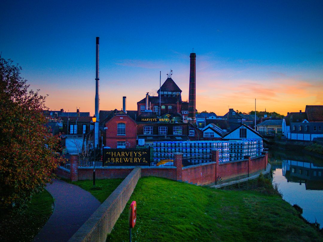 Harvey's Brewery at Dusk in Lewes, England with Stunning Sunset - Free Images, Stock Photos and Pictures on Pikwizard.com