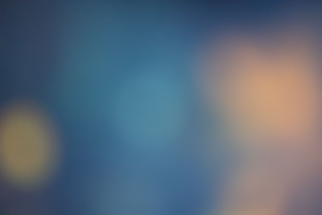 Soft Abstract Blurred Light Background with Blue and Orange Hues