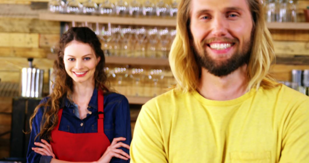 Happy Cafe Owners Standing at Counter with Glasses Background - Free Images, Stock Photos and Pictures on Pikwizard.com