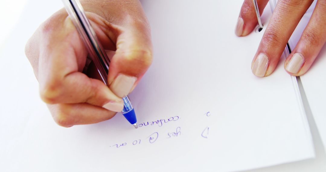 Person Writing on Paper with Blue Pen in Close-up View - Free Images, Stock Photos and Pictures on Pikwizard.com