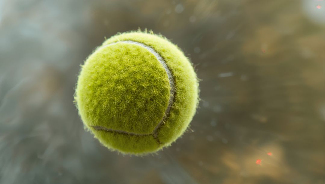 Floating Tennis Ball Capturing Motion and Energy in Abstract Style