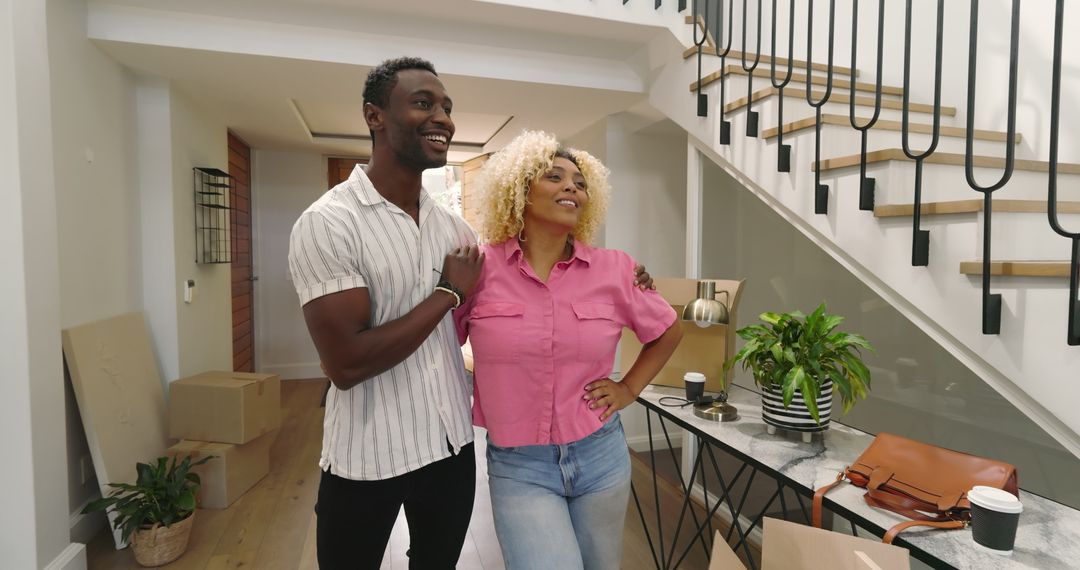 Couple Unpacking in Modern Home Interiors Highlighting New Beginnings