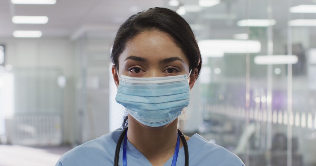 Healthcare Worker With Surgical Mask in Hospital - Free Images, Stock Photos and Pictures on Pikwizard.com