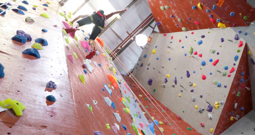 Person Climbing Artificial Indoor Wall in Gym - Free Images, Stock Photos and Pictures on Pikwizard.com