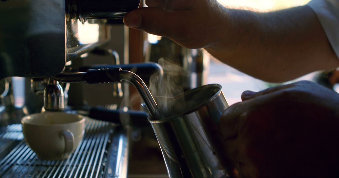 Barista Making Coffee with Steam Wand - Free Images, Stock Photos and Pictures on Pikwizard.com