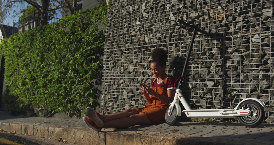 Young Woman Relaxing by Scooter on Urban Street - Free Images, Stock Photos and Pictures on Pikwizard.com