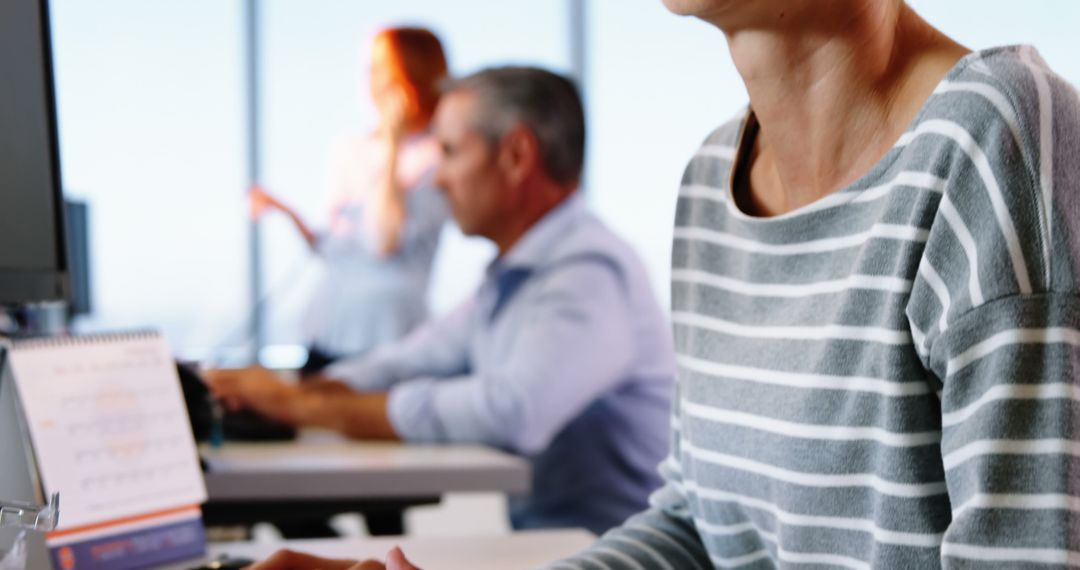 Professional Team in Modern Office with Collaborative Environment