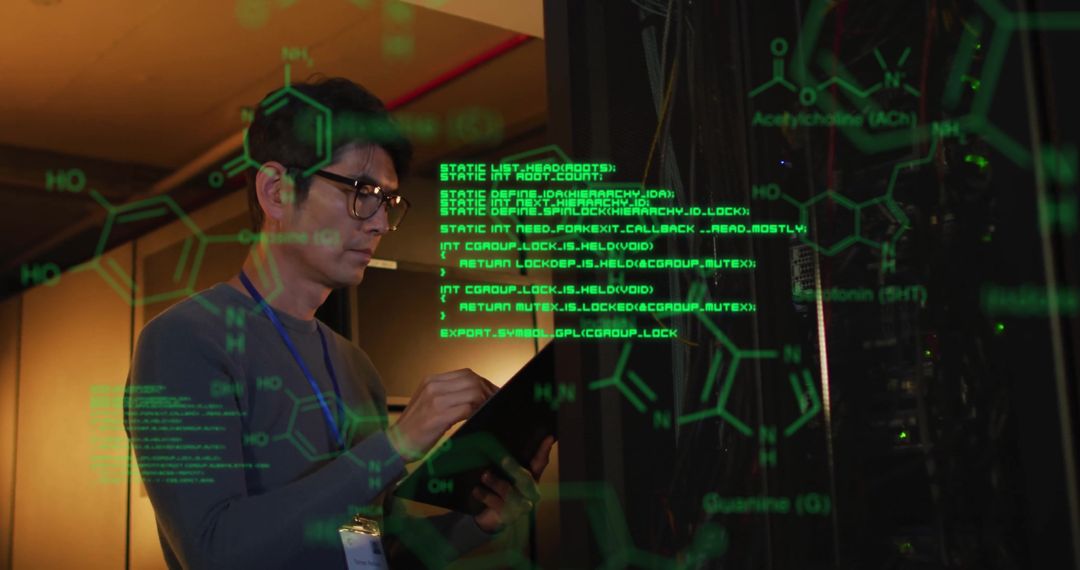 Asian Technician Analyzing Digital Data in Server Room