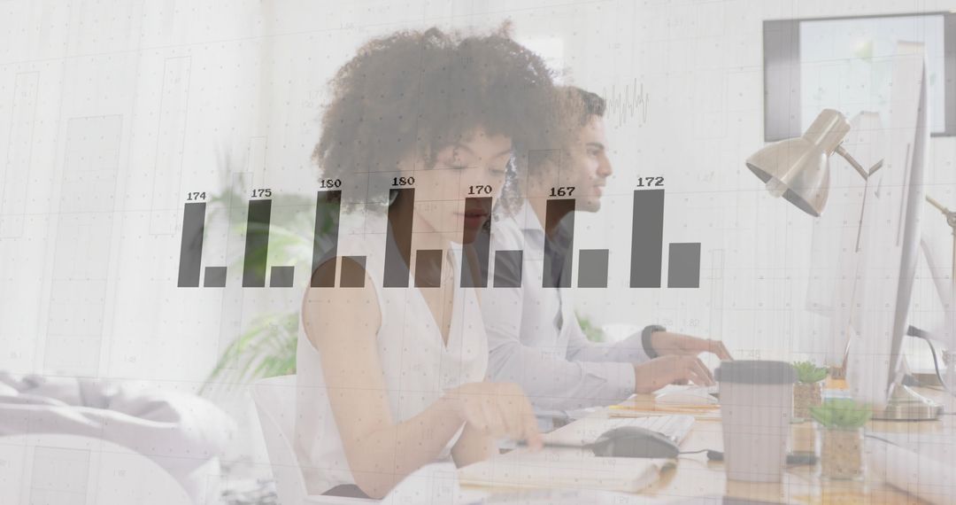 Colleagues Analyzing Data with Overlay Bar Chart in Office