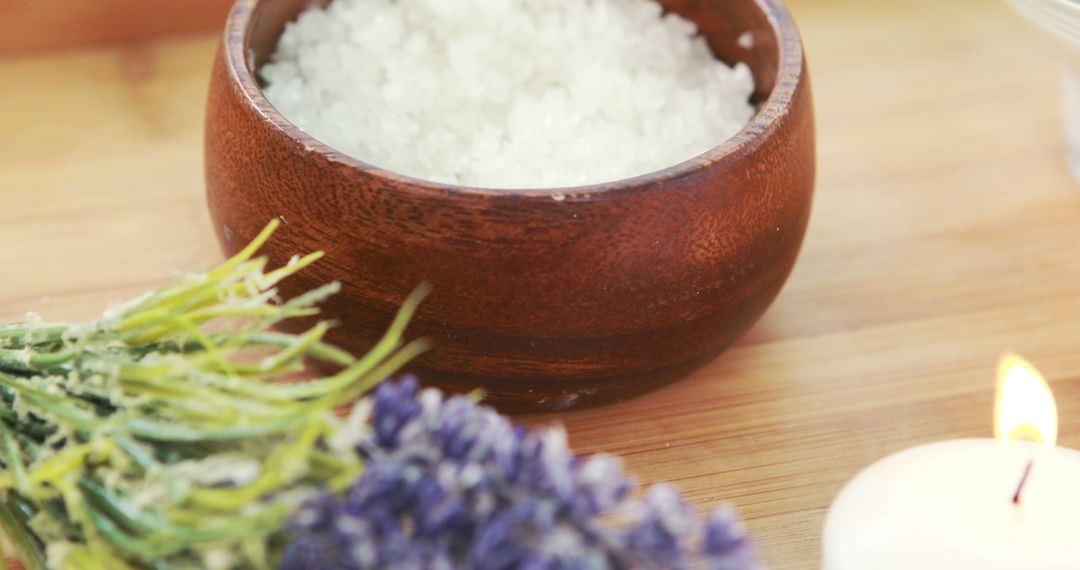 Wooden Bowl of Bath Salts with Lavender and Candle for Spa Relaxation - Free Images, Stock Photos and Pictures on Pikwizard.com