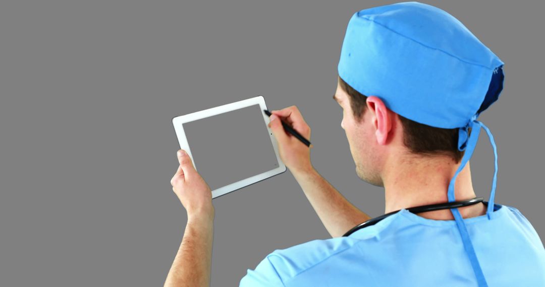 Doctor Using Digital Tablet for Medical Notes in Hospital - Free Images, Stock Photos and Pictures on Pikwizard.com