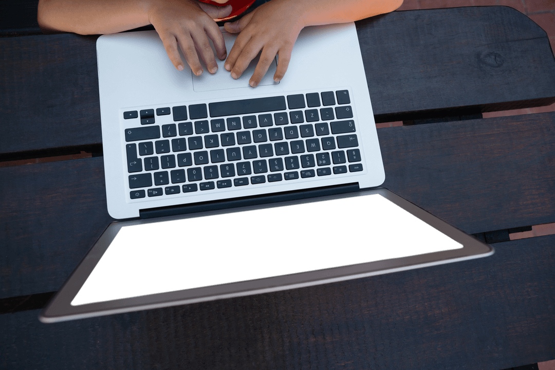 Child Using Laptop on School Bench with Transparent Background