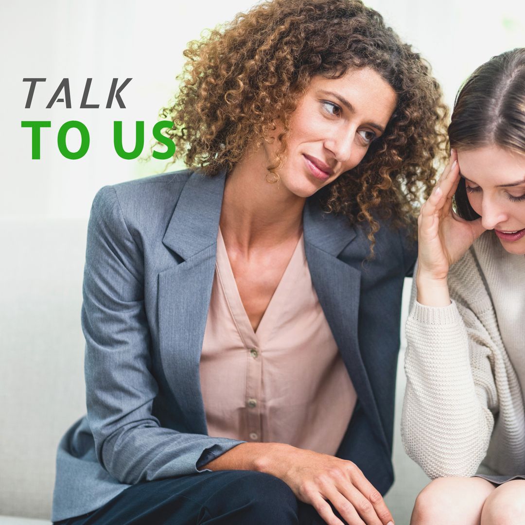 Supportive Counseling Session with Two Women Sharing Emotions