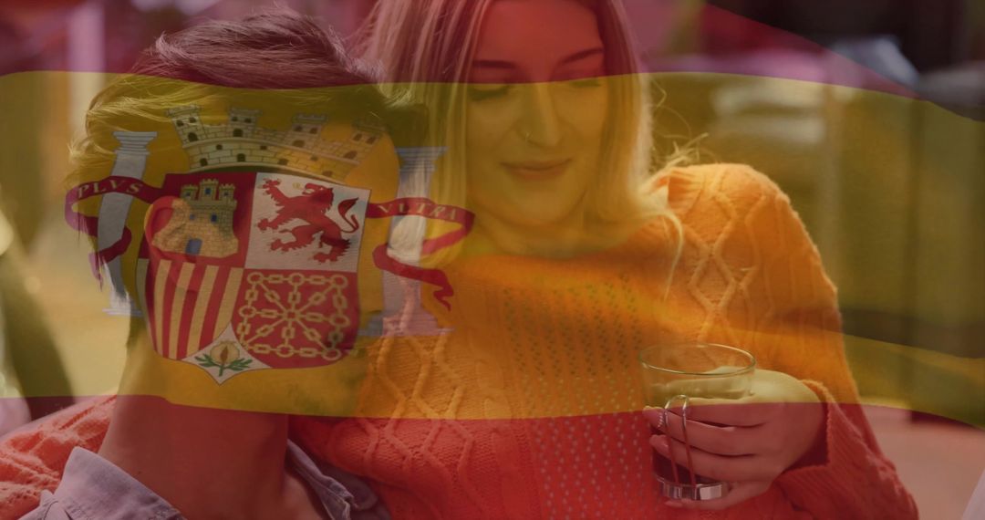 Intimate Couple Relaxing at Home with Spanish Flag Overlay