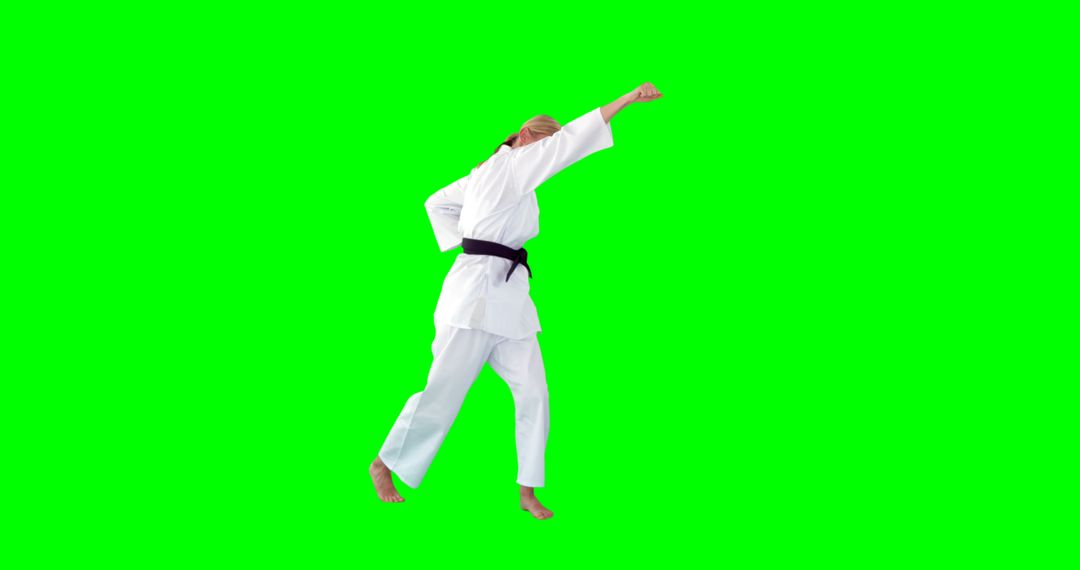 Karate Martial Artist Practicing Karate in White Gi on Green Screen - Free Images, Stock Photos and Pictures on Pikwizard.com