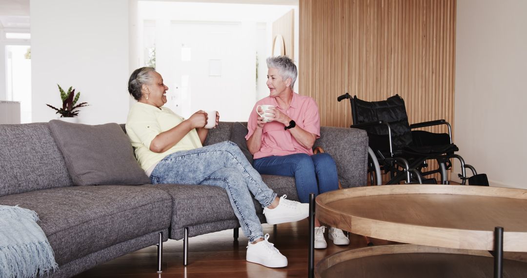 Multiracial Senior Couple Enjoying Coffee at Home