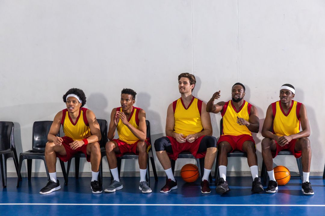 Basketball Team Bonding on Bench in Gym Environment