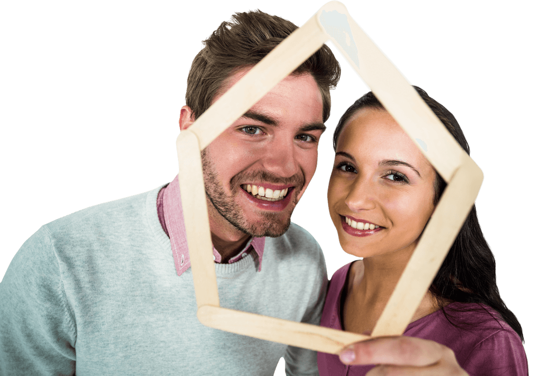 Couple Smiling Through Transparent House Frame