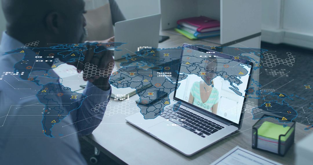 Man resting chin watching virtual meeting on laptop with global network overlay