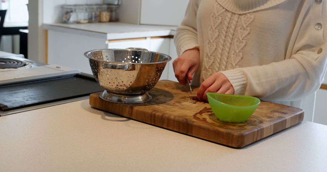 Person Preparing Vegetables on Kitchen Counter - Free Images, Stock Photos and Pictures on Pikwizard.com