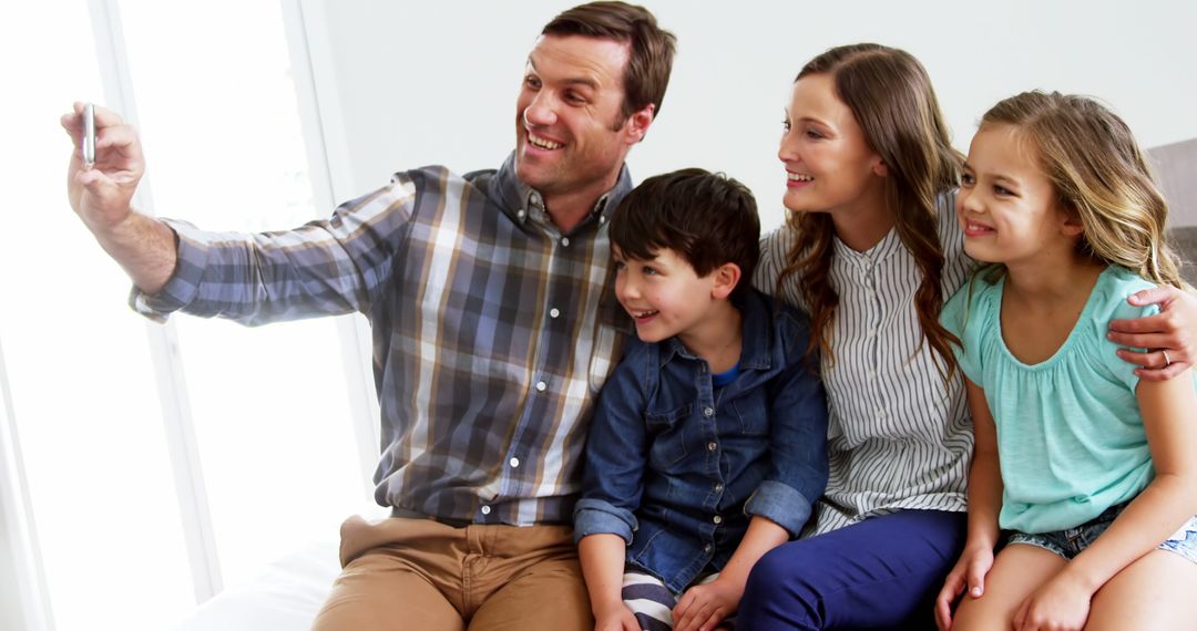 Happy Family Taking Selfie Indoors - Free Images, Stock Photos and Pictures on Pikwizard.com