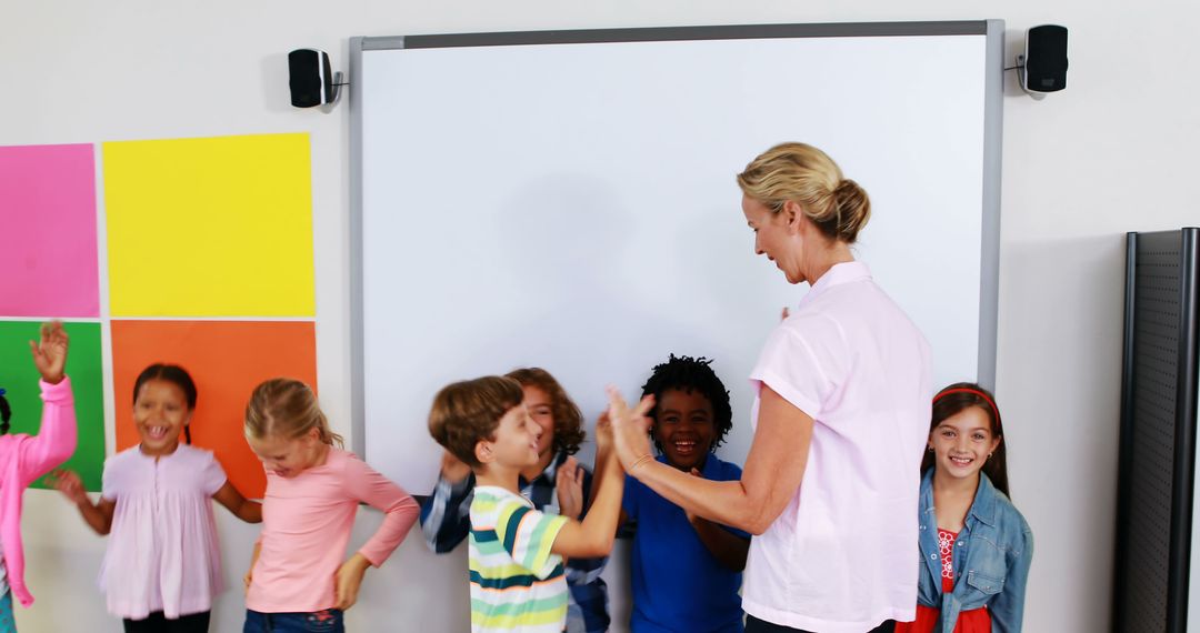 Teacher and Diverse Children Engaging in Classroom Activities