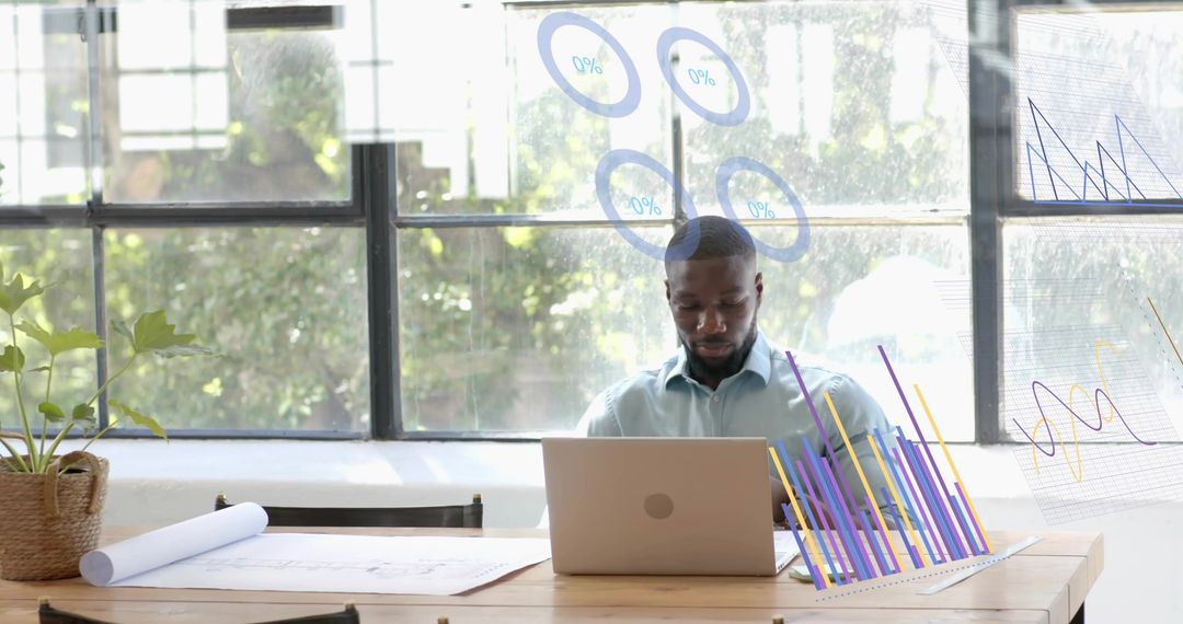 Man Working with Virtual Business Analytics Graphs in Office