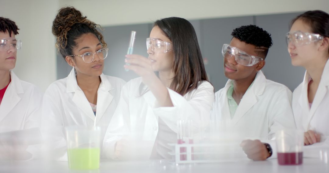 Diverse High School Students Conducting Chemistry Experiment in Lab