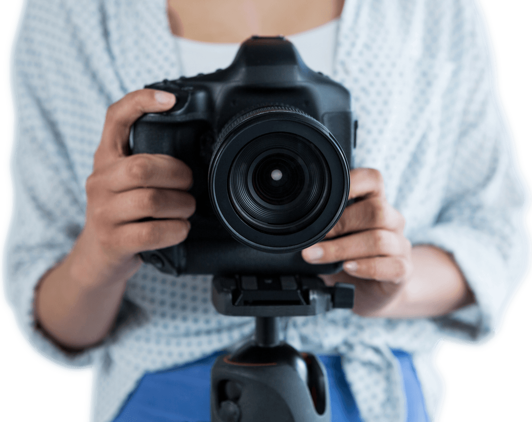 Photographer Holding Camera Against Transparent Background