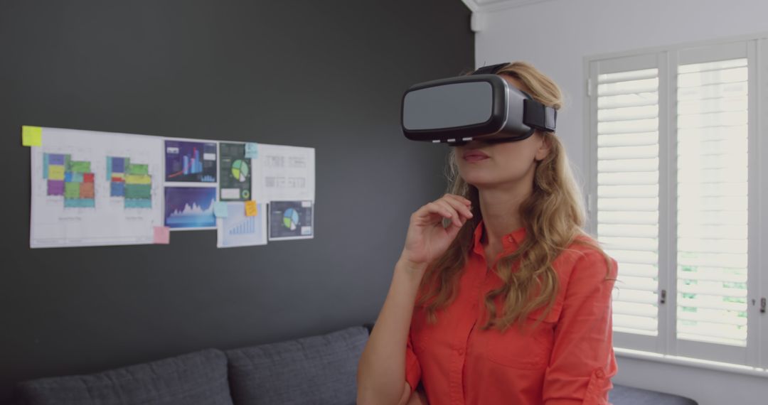 Woman Using VR Headset in Modern Office - Free Images, Stock Photos and Pictures on Pikwizard.com