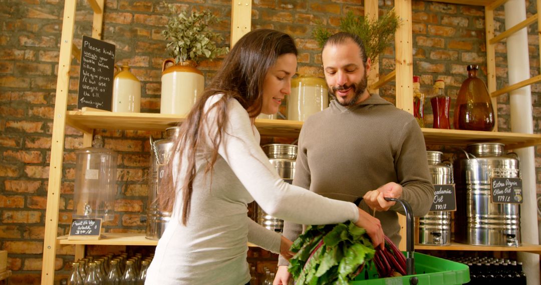 Couple Enjoying Fresh Vegetables in Organic Grocery Store - Free Images, Stock Photos and Pictures on Pikwizard.com