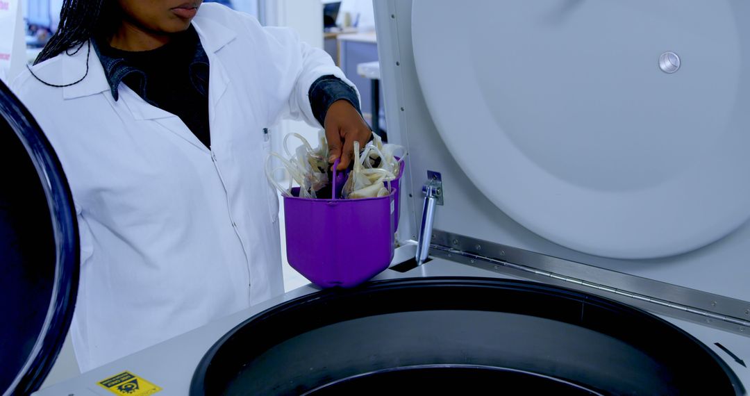 Scientist Using Centrifuge for Lab Experiments in Medical Research - Free Images, Stock Photos and Pictures on Pikwizard.com