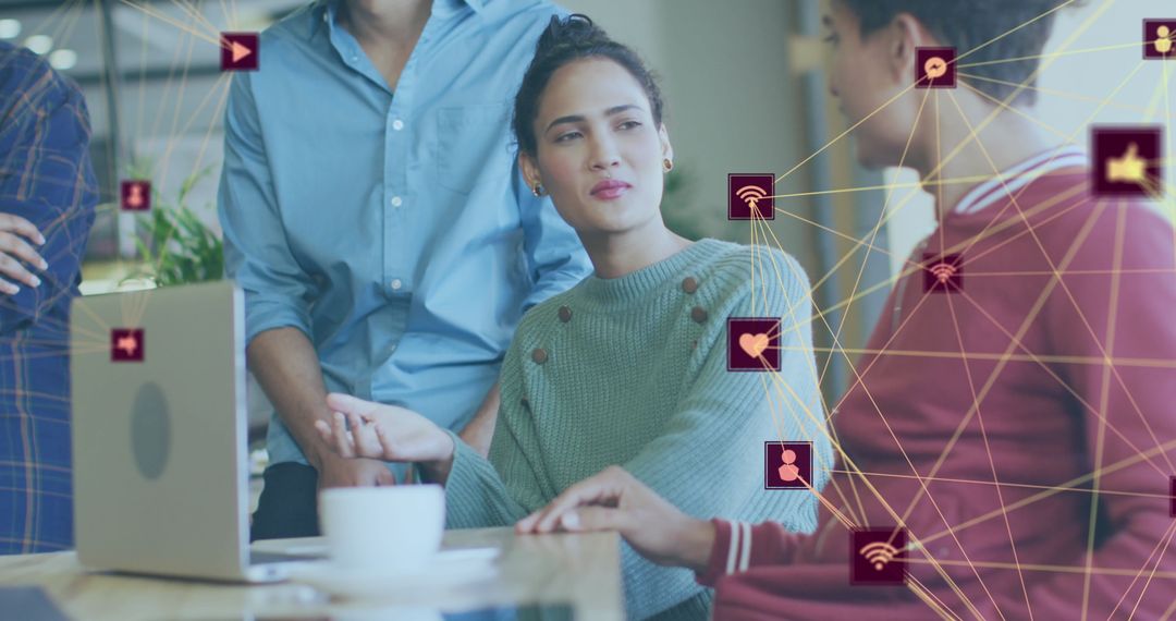 Diverse Team Discussing Digital Networking Strategy in Modern Office