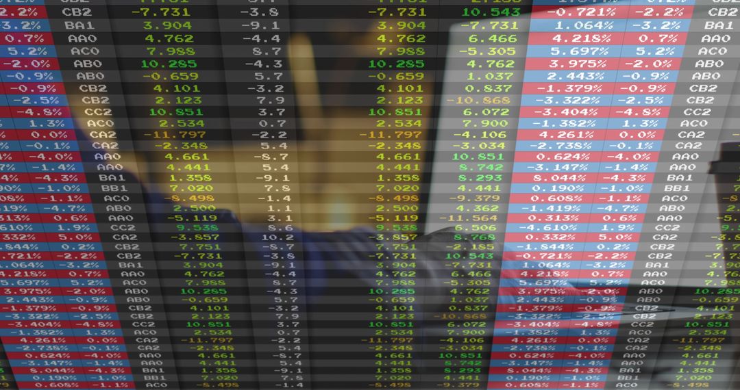 Business Professional Analyzing Live Financial Market Data on Screen