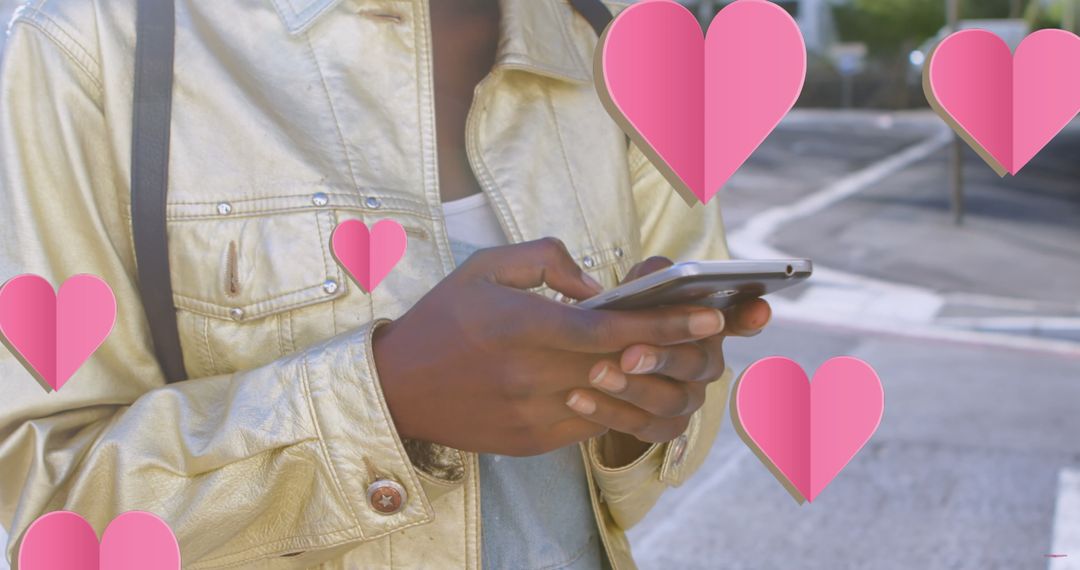 Woman in Metallic Jacket Texting with Floating Hearts
