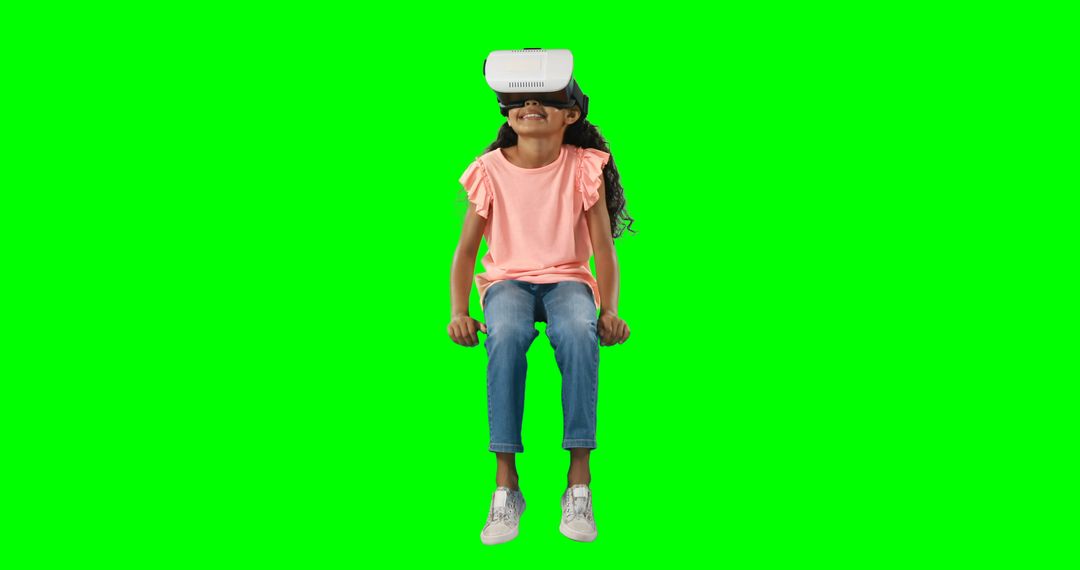 Excited Girl Using Virtual Reality Headset with Green Screen Background - Free Images, Stock Photos and Pictures on Pikwizard.com
