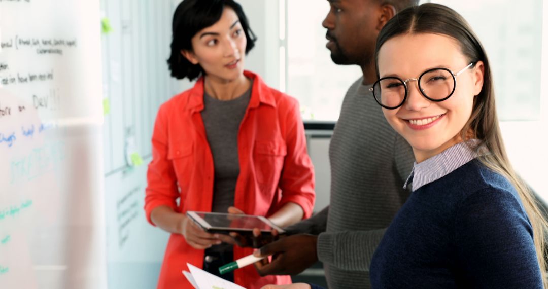 Diverse Professionals Engaging in Collaborative Office Discussion